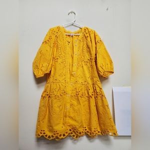 A bright yellow/light orange dress